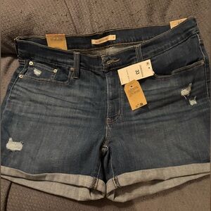 Levi women’s blue jean mid length shorts